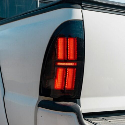 Alternative view of AlphaRex 05-15 Toyota Tacoma NOVA-Series Prismatic LED Tail Lights Black
